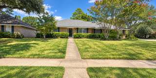 Spacious four-bedroom home located in University Terrace neighborhood with full fenced-in backyard. Gallery 1