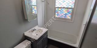 1123-1125 W 40th St. Gallery 13