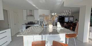 Stunning 3_Bed Home with Two Primary Suites & a Pool! Gallery 7