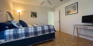 FURNISHED SHORT TERM RENTAL - 3 Bed / 2 Bath - Single Family Pool Home - $5,000/month ** Heated Swimming Pool **Canal View Gallery 48