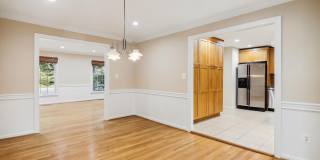 5 BR 4.5 BA home with inground heated pool and extensive hardscape! Gallery 16
