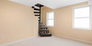 Spacious 2BR/2.5BA Townhome with Finished Basement & Extra Storage Gallery 32