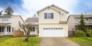 Spacious 3-Bedroom Home with Vaulted Ceilings, Fenced Yard  2-Car Garage in Puyallup!! Gallery 1
