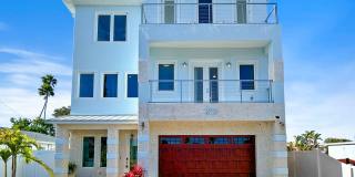 Waterfront Johns Pass Luxury | Steps to Beach + Pool, Hot Tub  Dock Gallery 1