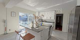 Stunning 3_Bed Home with Two Primary Suites & a Pool! Gallery 6