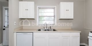 Updated Bungalow with Massive Deck and Fully Fenced Yard! Gallery 12