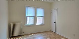 Large main floor duplex unit, Updated Kitchen & Bath, Full Dining Room w/Built-ins + Sunroom, garage stall Gallery 15