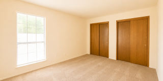 Incredibly spacious two-story condo in a NE heights neighborhood. Gallery 17