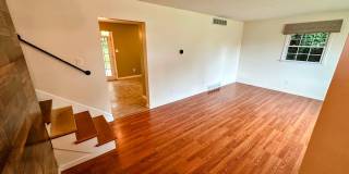 AVAILABLE NOW! Spacious 4 BR, 2 Bath House! Wood Floors, Attached Garage, W/D Included Gallery 3