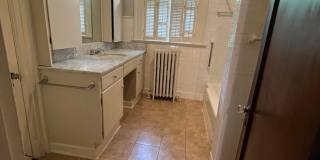 Central Gardens home with 4BR/2ba up w office/flex space. Wrap around, covered front porch! Pets are owners approval. Gallery 23