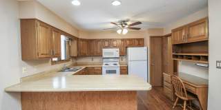 Spacious 5-Bedroom Split-Level in Southwest Sioux Falls with 4-Season Room & Fenced Yard! Gallery 4