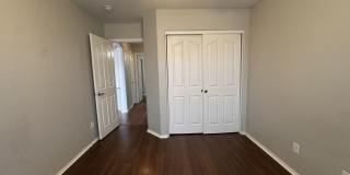 Single-level 3-bedroom home in a desirable Chandler location featuring a 2-car garage and tile roof and wood plank flooring throughout Gallery 29