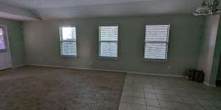 2 car garage with lighting, granite countertops. Backyard includes a custom extended concrete patio perfect for gatherings Gallery 22