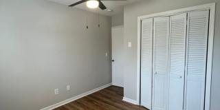 Travelers Rest !! 3 BR, 2 BA with Great Living Space - Den, Bonus Room, Primary Suite has a HUGE walk in Closet, Laundry Room, private screened in porch & deck AND a storage shed out back.  Fresh Paint and New LVP Floors Gallery 14