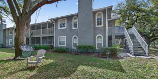 Lakeview corner condo in the desirable Raintree Village community! This 3-bedroom, 2-bath second-floor unit Gallery 1