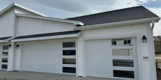 2 Bed | 2 Bath | 3 Stall Garage | Patio Twin-Home Gallery 1