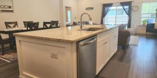 On the hunt for a beautiful, open floor plan home to rent close to downtown? Gallery 5