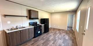 Brand new Efficiency 1 BR mobile home with large bonus room Gallery 1