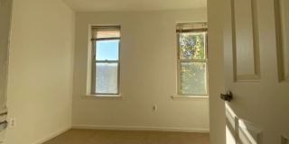 A charming two bedroom one and one half  bath row house located just off New Jersey Ave in the Shaw Neighborhood! Gallery 12