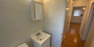 Private carport, in-unit laundry, and the Lakewood strip right outside your door. Gallery 9