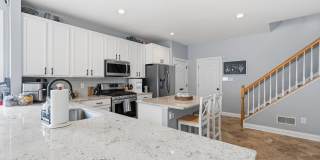 Step into a beautifully finished residence designed with an open and inviting layout that seamlessly connects each living space. Gallery 10