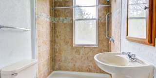 Available JULY- 2 Bedrooms, Yard, New Kitchen, New Shower, New Floors - Easy Access! Gallery 13