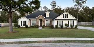 Spacious 4BR/3BA Home with 3-Car Garage, Fireplace & Fenced Yard in Knights Mill Gallery 1