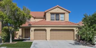 Summerlin!! 5 bedroom home!! W/Bed  bath downstairs!! 3 Car Garage!! Synthetic grass in front yard. Back has patio. Gallery 1