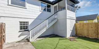 Bright  Updated 2BR Top Unit Duplex | White Kitchen  Stainless Appliances in Saint Petersburg Gallery 1