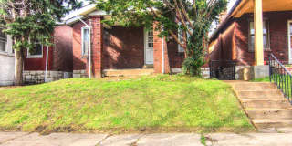 This 2 bedroom 1 bath home has been completely refinished with brilliant hardwood floors throughout! Gallery 1
