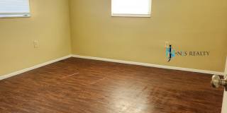 Beautiful 2/2/1 1150 Sq. Ft. with BONUS ROOM!!... tile & luxury plank flooring, Frest paint and a large fenced in yard! Gallery 12