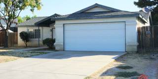 Spacious 3BD/2BA Home on a Large Lot in Bakersfield — Covered Patio, Garage & Pets Welcome! Gallery 1