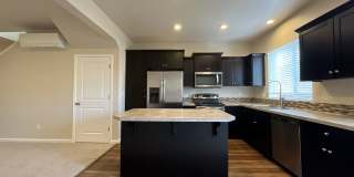 Stylish 3-Bedroom Bethany Residence with Open-Concept Living, Fenced Yard, and Attached Garage Gallery 5