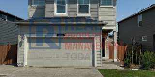 Modern 4-Bedroom Puyallup Home with A/C, Fenced Yard & 2-Car Garage Gallery 1