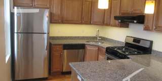 Large pet friendly, sunny, renovated 3 bed unit near Brookline Village. Gallery 1