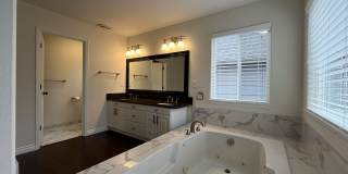 Grand 5 Bedroom Home Featuring 19ft Ceilings, Family Room & Main-Level Suite Gallery 46