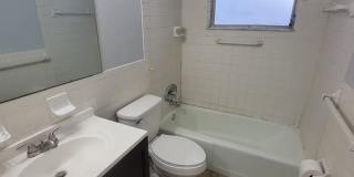 Spacious 2 Bed/ 1 Bath Triplex Apt. Trash and Lawn Included! Gallery 12