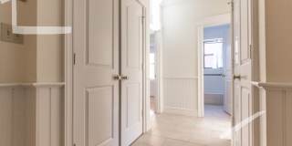 Newly renovated 2nd floor 1 bed unit right next to the Green Line! Gallery 1