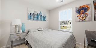 Welcome to this like new fully furnished home located in The Village at Courthouse Commons in Spotsylvania. Gallery 16