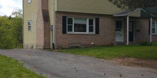 Spacious 4 Bedroom 2 1/2 bathroom Townhome With an ensuite located downstairs. Gallery 1