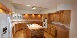 $500 move-in special_Spacious Country Club Home | 3-Car Garage + Basement Bonus Area Gallery 9