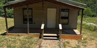 2 BEDROOM 1 BATH HOUSE ALL ELECTRIC CENTRAL HEAT  AIR HAS STACK WASHER/DRYER CONNECTION. Gallery 1