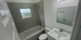 New 4 Bed / 2 Bath / 2 Car Garage Family Retreat in Desirable Lehigh Acres! Gallery 8