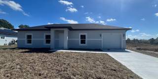NEW CONSTRUCTION- Modern 3 Bed / 2 Bath Home in Lehigh Acres Gallery 1