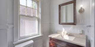 Spacious 3 Bedroom, 1.5 Bathroom with large Porch and Backyard Gallery 15