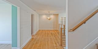 Remodeled, Bright & Airy End Unit Condo Overlooking Randall Preserve w/ Grand Entry Foyer, Open & Bright 2-Tiered Living Space, 3 Balconies & Oversized 2-Car Garage + Multi-Car Driveway in Newport Crest Community! Gallery 16