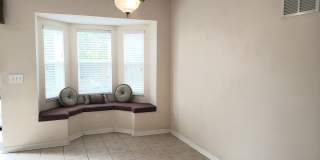 Well priced 4 Beds/2 Baths home with First Floor Master Suite, Fenced back yard and zero carpet! Gallery 5