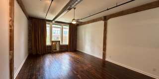 Amazing studio in the William Farrington Buildiing.  UTILITIES INCLUDED EXCLUDES CABLE AND INTERNET.  Pets not allowed.  One car parking in garage included. Gallery 9