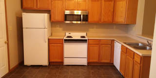 Spacious 2BD 2 BA duplex with 2 Car attached garage. Just a few steps away from everything you need! Gallery 1