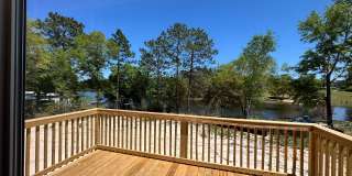 SPECTACULAR WATER-VIEW W/ LARGE DECK NEWER  MOBILE HOME Gallery 1